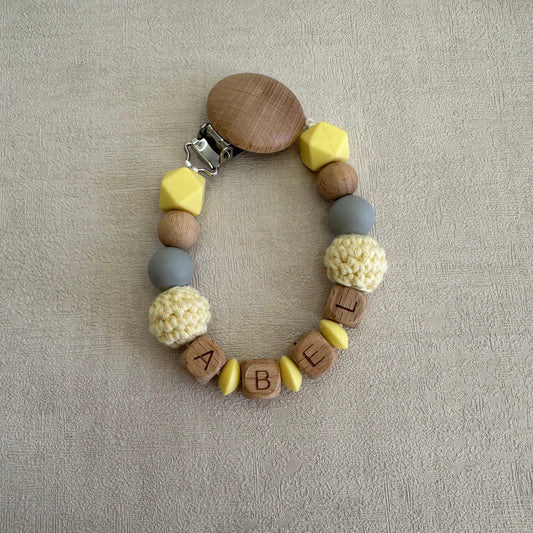 Attache tétine jaune & gris